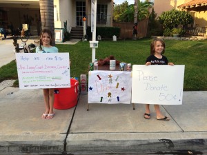 Ainsley (left) and Peyton (right) with their drinkls table.